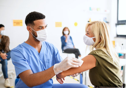 woman getting a vaccine